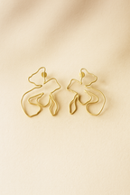Naksh Floral Earrings on beige background